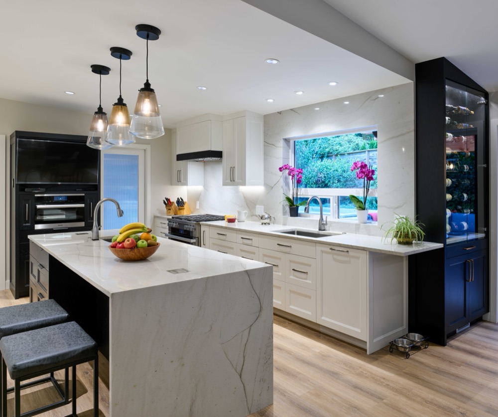 Kitchen, dining room and outdoor living space remodel view